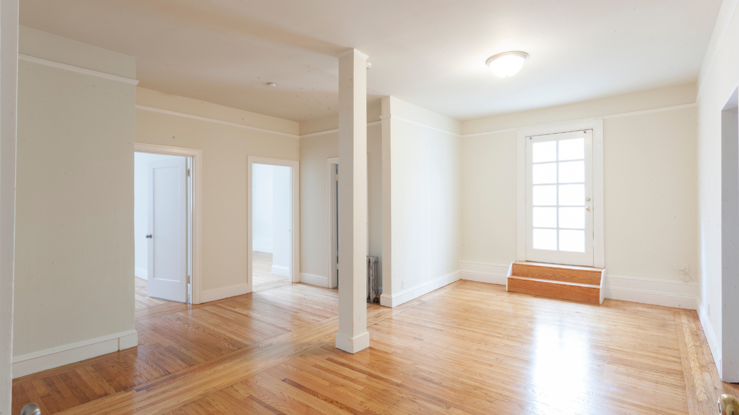 Empty shared home with several bedroom doors